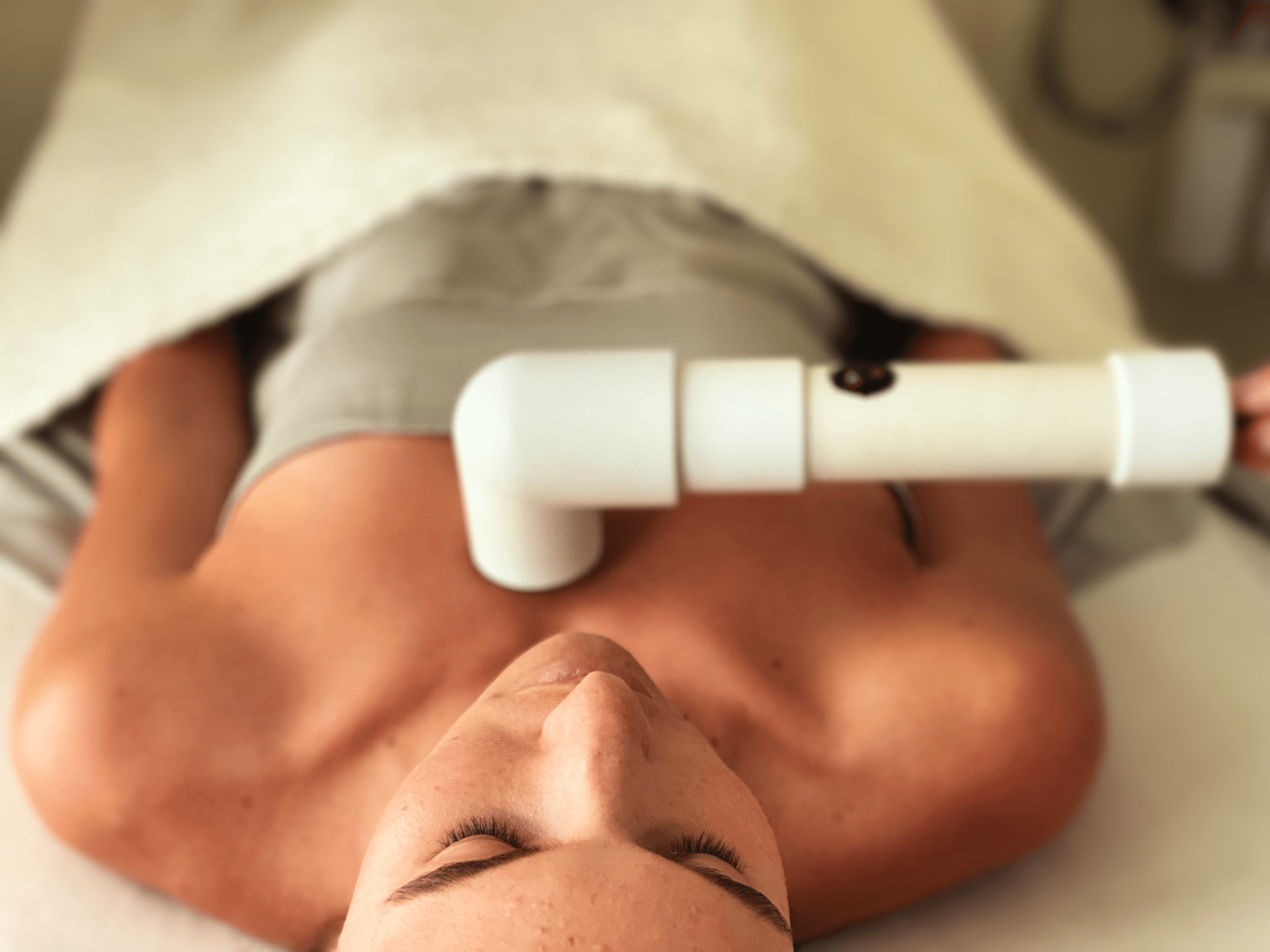 Client receiving electro-lymphatic drainage treatment